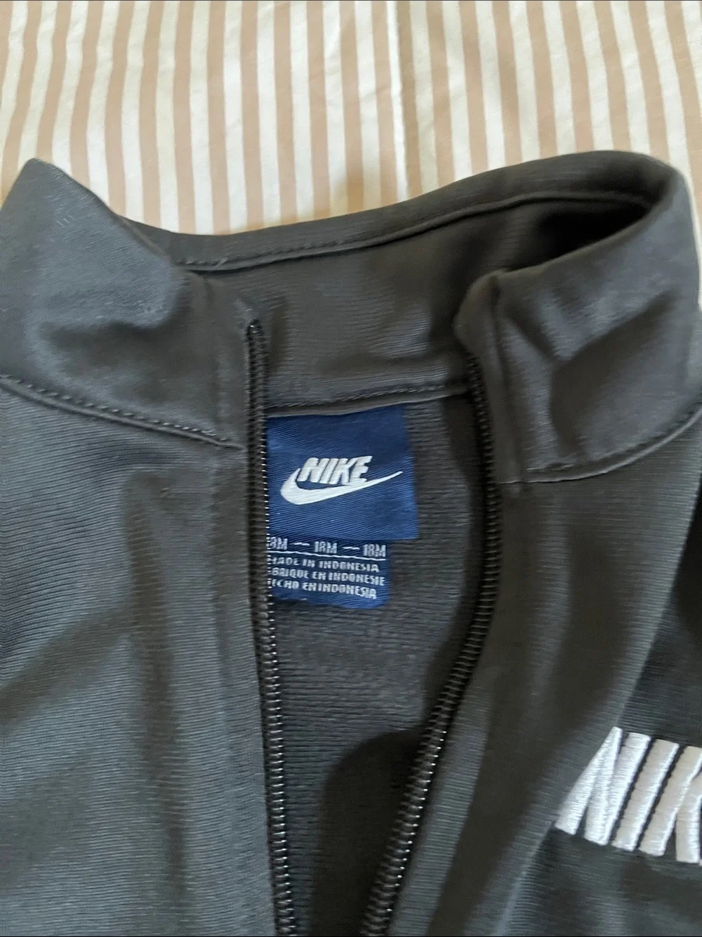 Nike Black Track Jacket with White Logo & Piping